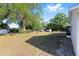 Spacious backyard providing ample room for outdoor activities and gatherings at 614 Third Ave, Lady Lake, FL 32159