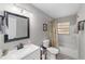 Updated bathroom with modern fixtures, a shower-tub combo, and neutral colors at 6318 Nw 52Nd Ave, Ocala, FL 34482