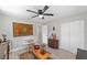 Relaxing bedroom with a ceiling fan, closet, and decorative wall hangings at 6318 Nw 52Nd Ave, Ocala, FL 34482