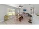 Open-concept dining area with a view of the kitchen and outdoor scenery at 6318 Nw 52Nd Ave, Ocala, FL 34482