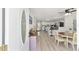 Bright kitchen with modern appliances and open layout to dining area at 6318 Nw 52Nd Ave, Ocala, FL 34482