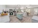 Well-equipped kitchen with stainless steel appliances and a charming mobile island at 6318 Nw 52Nd Ave, Ocala, FL 34482