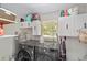 Well-equipped laundry room with modern washer and dryer units and ample storage cabinets for supplies at 6318 Nw 52Nd Ave, Ocala, FL 34482