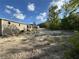 A large lot offering plenty of trees and space to enjoy the outdoors at 6658 Sw 165Th Ct, Ocala, FL 34481