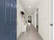 Inviting entryway with tile flooring and a glimpse into the home's interior at 716 Hickory Course Loop, Ocala, FL 34472