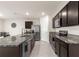 Spacious kitchen featuring a large island, stainless steel appliances, and modern finishes at 716 Hickory Course Loop, Ocala, FL 34472
