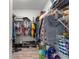 Spacious walk-in closet with ample storage for shoes, clothes, and accessories at 716 Hickory Course Loop, Ocala, FL 34472
