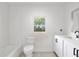 Bright, newly remodeled bathroom with modern fixtures and white subway tile at 721 Ne 2Nd St, Ocala, FL 34470