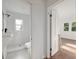 Newly renovated bathroom with a tiled shower and modern fixtures at 721 Ne 2Nd St, Ocala, FL 34470