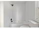Clean bathroom featuring white subway tile in the shower and a modern shower head at 721 Ne 2Nd St, Ocala, FL 34470