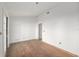 Spacious bedroom with natural light, showcasing the unfinished flooring at 721 Ne 2Nd St, Ocala, FL 34470