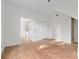 Bright living room with hardwood floors, white walls, and trim at 721 Ne 2Nd St, Ocala, FL 34470