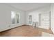 Bright living room with hardwood floors, white walls and natural light at 721 Ne 2Nd St, Ocala, FL 34470