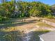 Aerial view of the large grass-filled yard, perfect for a variety of outdoor activities at 721 Ne 2Nd St, Ocala, FL 34470