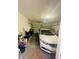 Spacious garage with a parked white sedan, an open garage door, and ample storage space at 807 Glen Creek Ct, Fruitland Park, FL 34731
