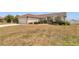 Well-kept single-story home with a spacious lawn and traditional design elements at 8127 Sw 60Th Ct, Ocala, FL 34476
