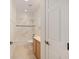 Bright bathroom featuring a shower-over-tub, wooden vanity and tiled floor at 8632 Sw 86Th Cir, Ocala, FL 34481