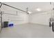 Large garage featuring epoxy flooring and a mini split air conditioner at 8632 Sw 86Th Cir, Ocala, FL 34481