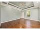 Large main bedroom with hardwood flooring, and decorative tray ceiling at 8632 Sw 86Th Cir, Ocala, FL 34481