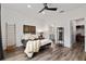 Bedroom with modern décor including a ladder accent and an en-suite bath and closet at 8798 Sw 79Th Pl, Ocala, FL 34481