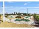 Entertaining miniature golf course featuring artifical greens, landscaping and various hole designs at 8798 Sw 79Th Pl, Ocala, FL 34481