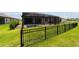 This home features a screened pool, covered patio, and fenced green yard, perfect for outdoor relaxation at 8875 Sw 58Th Street Rd, Ocala, FL 34481