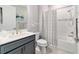 Cozy bathroom with a modern vanity, tiled shower, and updated fixtures at 8875 Sw 58Th Street Rd, Ocala, FL 34481