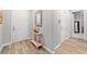 Elegant entryway with hardwood floors, a decorative table, and well-lit ambiance at 8875 Sw 58Th Street Rd, Ocala, FL 34481
