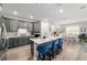 Spacious kitchen with stainless steel appliances, a center island, and eat in kitchen dining at 8875 Sw 58Th Street Rd, Ocala, FL 34481