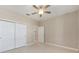 Bedroom features a closet with sliding doors and access to ensuite bathroom at 8952 Sw 79Th Ln, Ocala, FL 34481