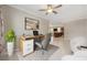 Home office features desk, chair, and shelving for efficient work-from-home setup at 8952 Sw 79Th Ln, Ocala, FL 34481