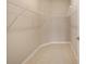 Empty walk-in closet with tile flooring and built-in shelving ready to be customized at 8952 Sw 79Th Ln, Ocala, FL 34481