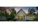 Charming single-story home with a well-maintained lawn and inviting front porch at 942 Ne 5Th St, Ocala, FL 34470