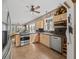 Well-lit kitchen features stainless steel appliances, light wood cabinets, and a gas range at 942 Ne 5Th St, Ocala, FL 34470