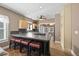 Spacious kitchen island and bar stool seating at 942 Ne 5Th St, Ocala, FL 34470