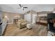 Inviting living area with a sofa, dining table, and modern appliances, perfect for comfortable living at 942 Ne 5Th St, Ocala, FL 34470