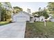 Charming single-story home features an attached two car garage and spacious driveway at 9525 Sw 53Rd Cir, Ocala, FL 34476