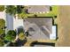 Aerial view of a well-maintained home with a tile roof and lush landscaping at 9532 Sw 70Th Loop, Ocala, FL 34481