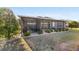 The back of the home features a screened-in lanai and meticulously maintained landscaping, creating a serene outdoor oasis at 9532 Sw 70Th Loop, Ocala, FL 34481