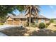 Beautiful home featuring a three-car garage, manicured landscaping, and an inviting front entrance at 9532 Sw 70Th Loop, Ocala, FL 34481