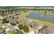 An aerial view of well-maintained homes with lush green landscaping in a quiet neighborhood at 9532 Sw 70Th Loop, Ocala, FL 34481