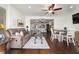 Cozy living room with hardwood floors and sliding glass doors at 9532 Sw 70Th Loop, Ocala, FL 34481