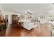 Expansive open-concept living room with hardwood floors, modern design and lots of light at 9532 Sw 70Th Loop, Ocala, FL 34481