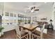 Cozy living room with hardwood floors and sliding glass doors at 9532 Sw 70Th Loop, Ocala, FL 34481