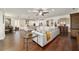 Spacious open-concept living room with hardwood floors and a view to the outside at 9532 Sw 70Th Loop, Ocala, FL 34481