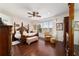 The main bedroom features a four poster bed, sitting area, and beautiful water views at 9532 Sw 70Th Loop, Ocala, FL 34481