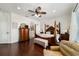 Comfortable main bedroom showcases traditional furnishings, and a lovely ensuite bath at 9532 Sw 70Th Loop, Ocala, FL 34481