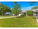 Charming home featuring a well-manicured lawn and meticulously maintained landscaping, enhancing its curb appeal at 9638 Sw 94Th Ave # C, Ocala, FL 34481