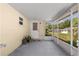 Inviting screened porch overlooking the backyard with a convenient entrance to the home at 9638 Sw 94Th Ave # C, Ocala, FL 34481