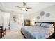 Bright bedroom with en-suite bathroom access, closet and light gray walls at 8875 Sw 58Th Street Rd, Ocala, FL 34481